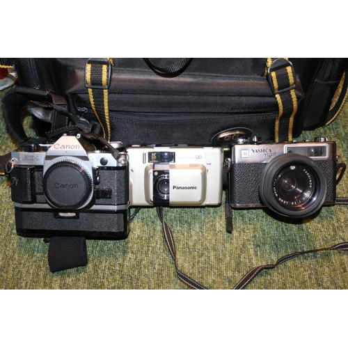 260 - Collection of assorted Cameras to include Canon AE1, Yashica MG-1 with assorted Lenses and accessori... 