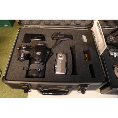 293 - 2 Cased collections of cameras to include Nikon F65 with AF Nikkor 70-300mm lens and assorted camera... 