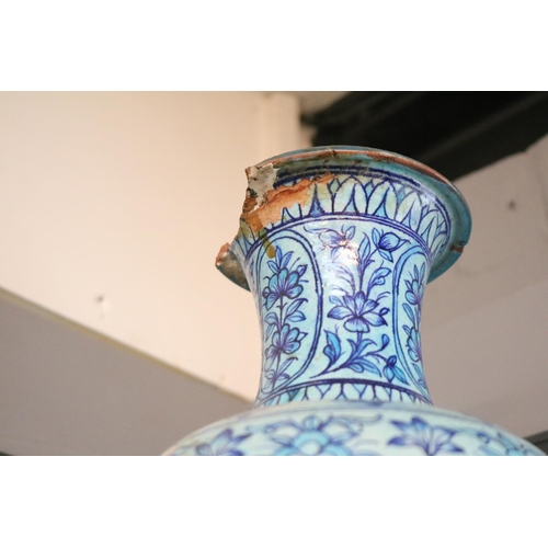 31 - Large Chinese Lidded Ginger Jar with floral decoration and a Persian blue floral decorated vase. 45c... 