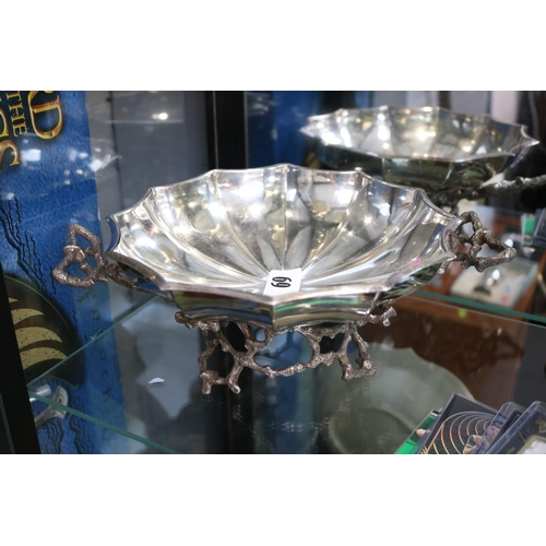 69 - A Good quality Silver plated 20thC shaped bowl raised on naturalistic base 29cm in Width