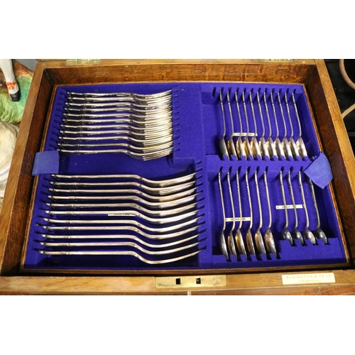 111 - Elkington Oak Cased Canteen of Cutlery with bone handles and brass fittings