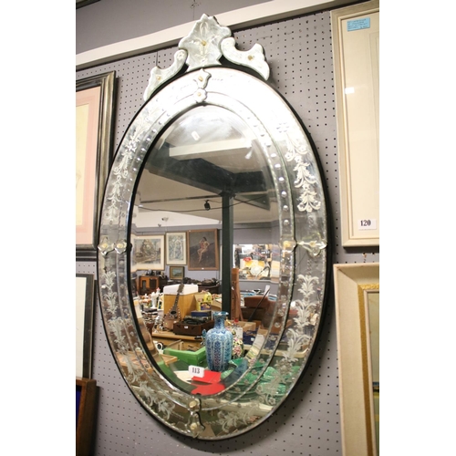 113 - Oval Venetian mirror with engraved floral decoration with bevelled glass