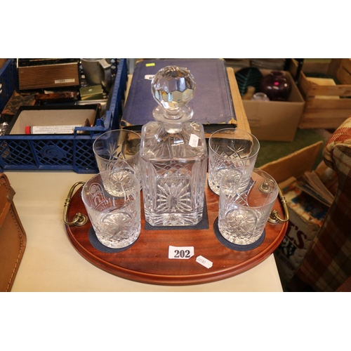 202 - Good Quality Crystal Decanter and a set of 4 glasses with etched decoration on oval wooden tray with... 