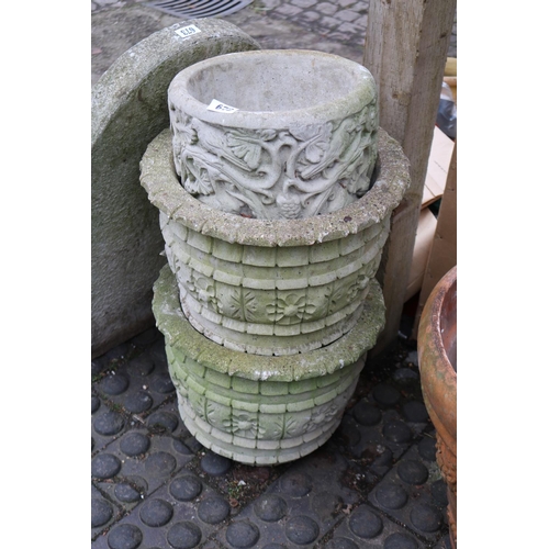 672 - Pair of Concrete Garden pots and a Floral decorated garden pot