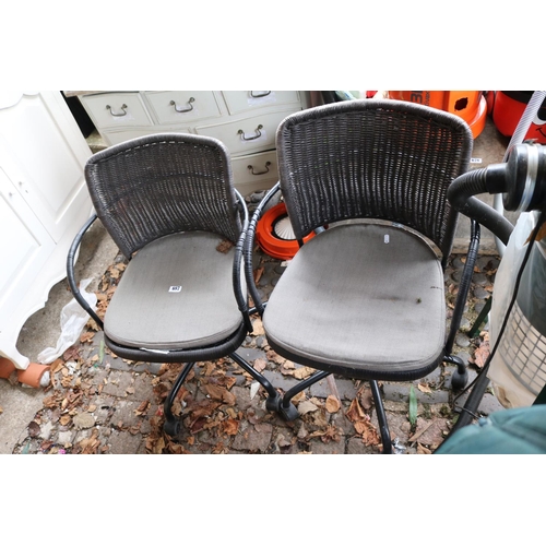 687 - Pair of Rattan swivel Chairs