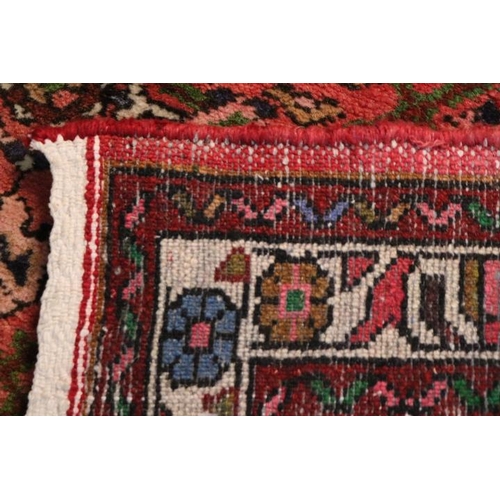 133 - Good quality Red Ground Persian rug 306cm in Length