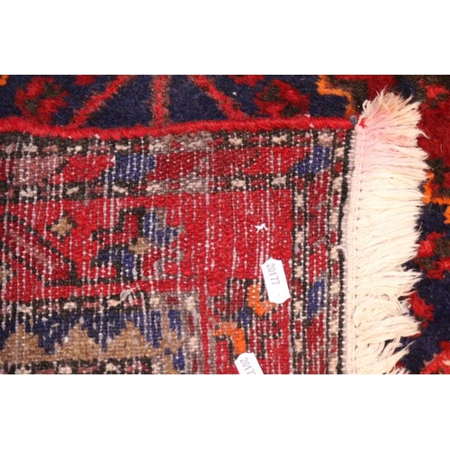 134 - Persian Red and Blue ground Rug of 3 Medallions 220cm in Length