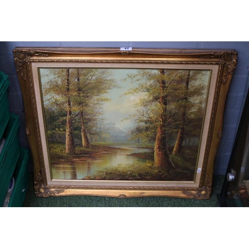 47 - Gilt Framed Oil on canvas of a Woodland river scene signed Cantrell