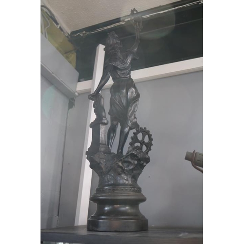 48 - Large Spelter Industrial type figure on circular base. 67cm in Height