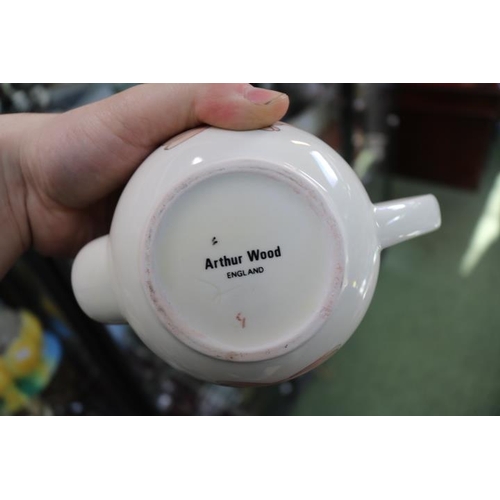 52 - Collection of assorted Novelty Teapots to include Arthur Wood, Carlton ware etc (9)