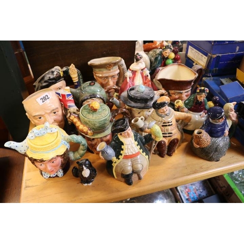 202 - Collection of Royal Doulton and other Character Jugs and Teapots to include Winston Churchill, Glenn... 