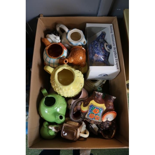 301 - 4 Boxes of assorted Novelty Teapots