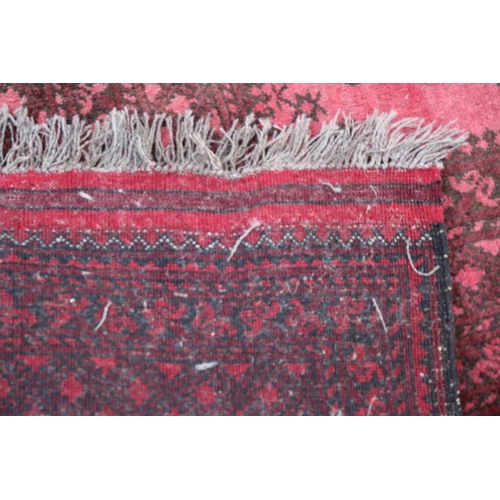 366 - Very Large Red Ground Persian Rug with tassel ends