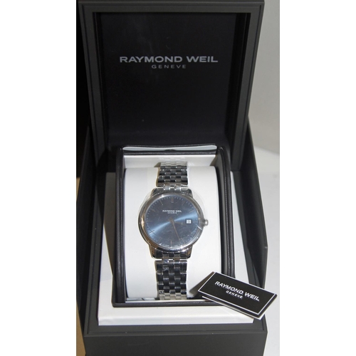 519e - NEW Raymond Weil 5485 Men's Date Bracelet Strap Watch Silver/Blue £695 Retail. A brand NEW Raymond W... 