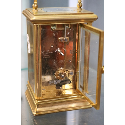 145 - St James of London Brass Carriage clock with roman numeral dial