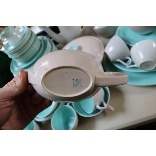 223 - Large collection of Poole Pastel dinnerware