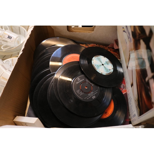 310 - Collection of assorted Vinyl records to include The Moody Blues, Elton John etc.