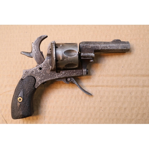 403 - 19thC Ladies Revolver with folding handle and chequered handle