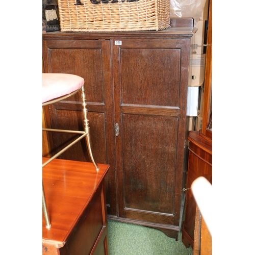 578 - Oak Paneled cupboard with Linen press interior