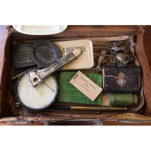 99n - A Small leather case containing various military and advertising items