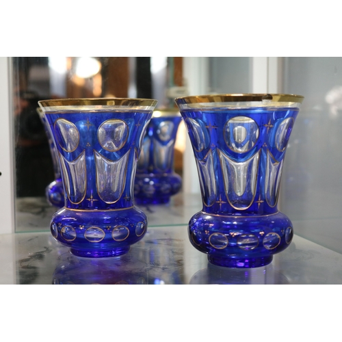 146 - Pair of 19thC Panelled Bohemian Overlay clear and blue glass beakers 12.5cm