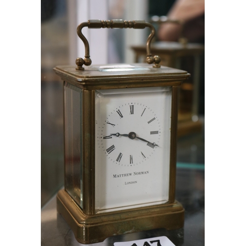 147 - Matthew Norman Brass Carriage clock with Roman numeral dial