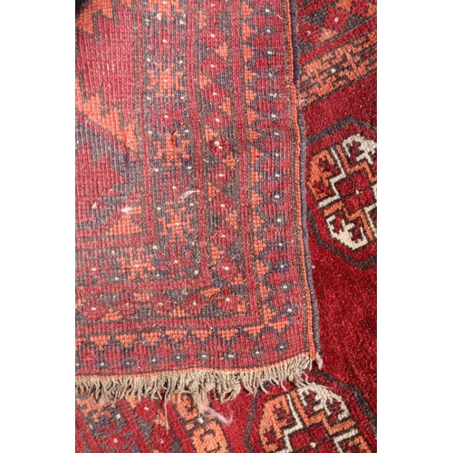 35 - Red Ground Turkmen Rug 144cm in Length