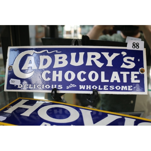 88 - Cadburys Chocolate Delicious and Wholesome enamel advertising sign. 30cm in Length