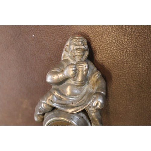 81 - Ancient Order of Froth Blowers Car Mascot depicting a Man on Barrel. 16cm in Length
