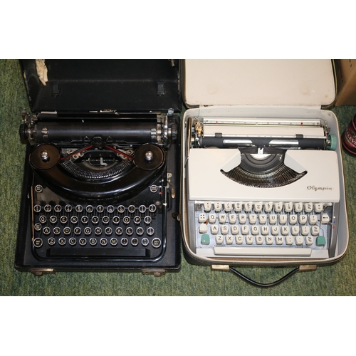 121 - 2 Vintage Cased Typewriters