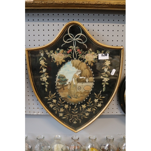 126 - Georgian Silk of Shield form depicting a woman at memorial within floral garnitures. 46cm in Height