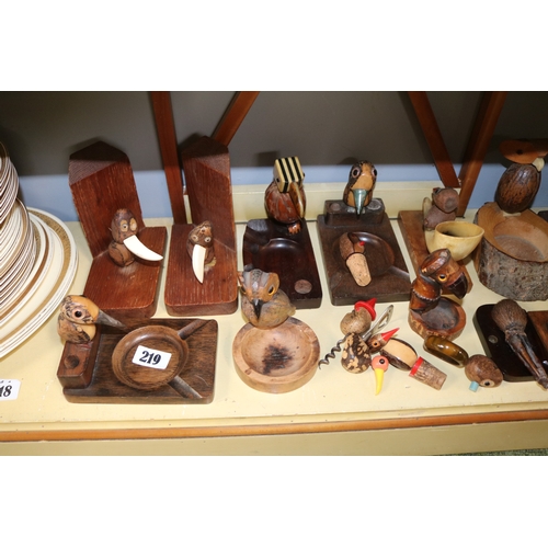 219 - Large collection of Dunhill and other YZ Nut Bird carved Ashtrays