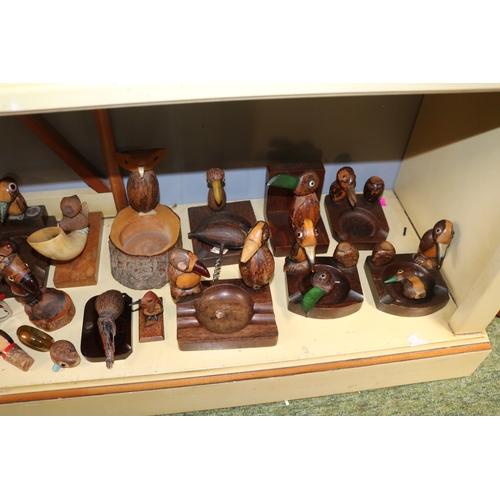 219 - Large collection of Dunhill and other YZ Nut Bird carved Ashtrays