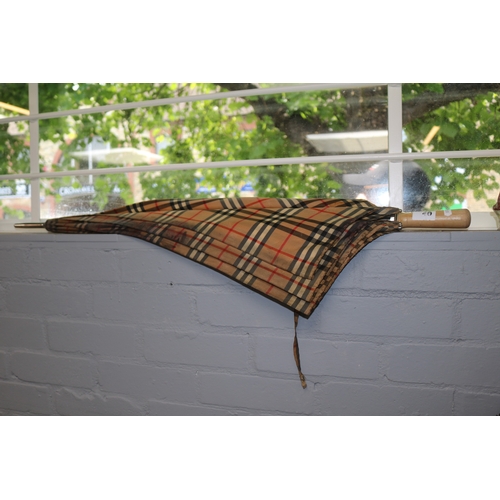 46 - Vintage Burberrys Umbrella with lightwood handle. 97cm in Length