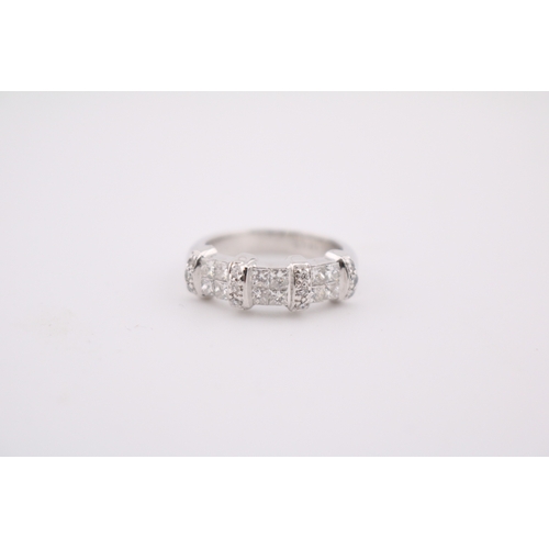Fine Ladies 18ct White Gold Handmade ring comprising of 12 Brilliant cut Diamonds 0.24ct with 12 Princess cut Diamonds approx. 0.96ct. VS/SI G/H Estimated. Size L. 6.4g total weight Insurance Valuation of £8000