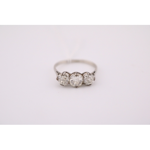 Ladies 18ct Gold 3 Stone Diamond Trilogy ring. 0.60ct Brilliant cut flanked by 2 0.40ct Diamonds. Total 1.40ct estimated Si G/H. Size L. 2.6g total weight