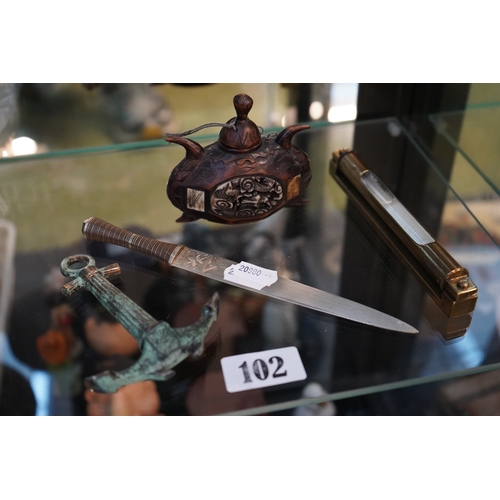 102 - Chinese carved scent bottle, Brass Level, White metal paper knife and a model of an Anchor