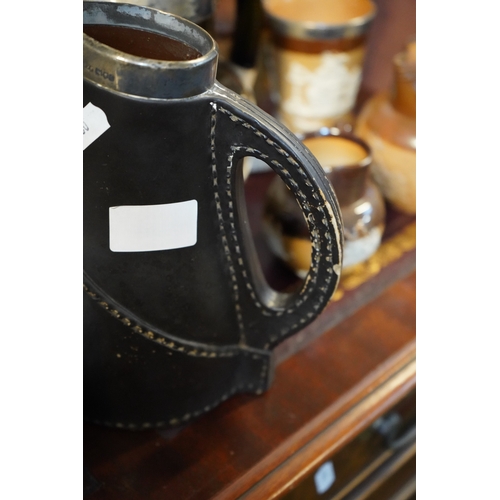 202 - Collection of assorted Two Tone Harvest Jugs and a Doulton Lambeth Blackjack Jug etc.