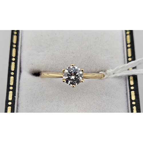 437 - Ladies 14ct CZ claw set ring Size M. 1.3g total weight