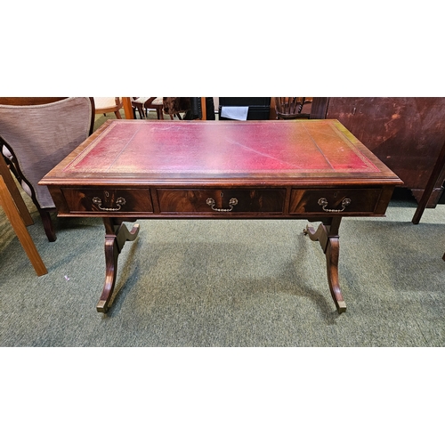 524 - Edwardian Leather topped Regency style Library table on brass casters