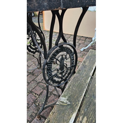 580 - Cast Iron Singer Sewing machine table base with planked top