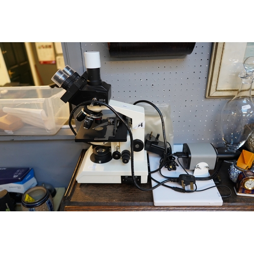 254 - Binocular Compound Microscope of 4 lenses with power supply