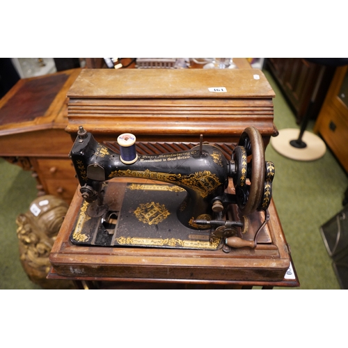 464 - Cased Singer Sewing machine