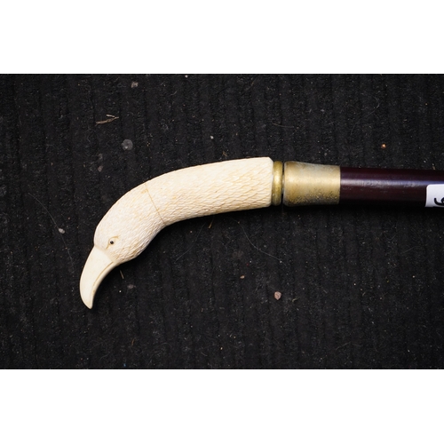 376 - Walking Cane with Wildfowl handle and metal collar