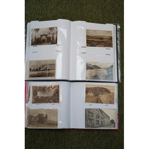 32 - 2 Albums of assorted Edwardian and later Postcards to include Topographical, Shipping etc.