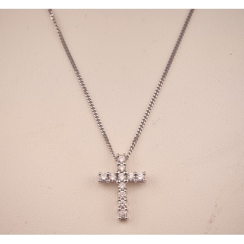 523 - Ladies 9ct Gold Diamond Set cross on 9ct gold chain 0.25ct. 44cm in Length. 2.1g total weight
