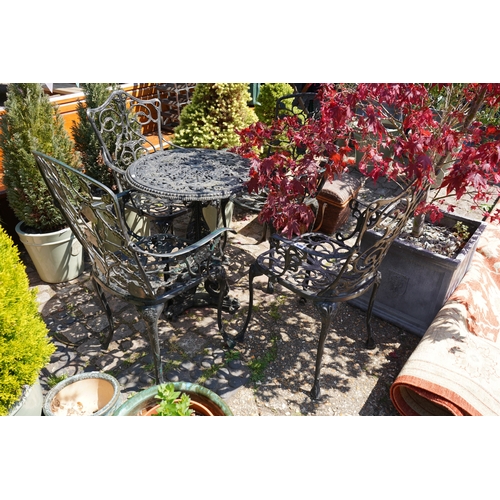 696 - Metal painted garden table and 4 chairs
