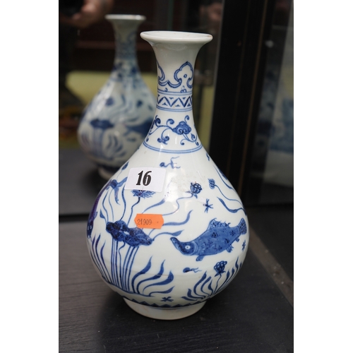 16 - Chinese Blue & White Baluster vase decorated with Koi and Flora.