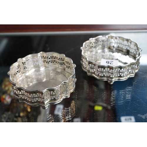26 - Pair of Silverplated Coasters with pierced gallery on spherical feet