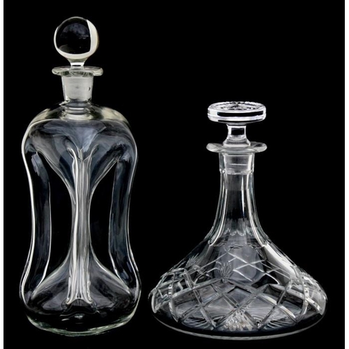 22 - An early 20th century clear glass decanter with waisted body; together with a cut glass ship's decan... 